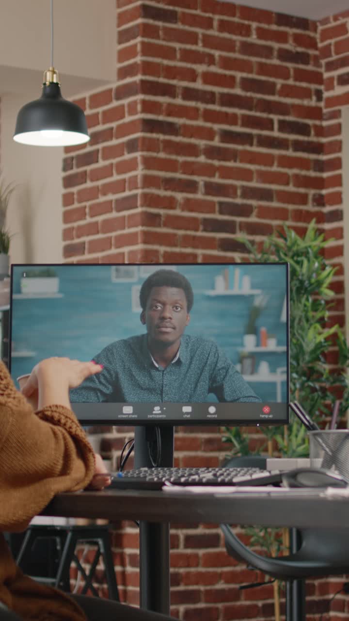 People in video call on computer