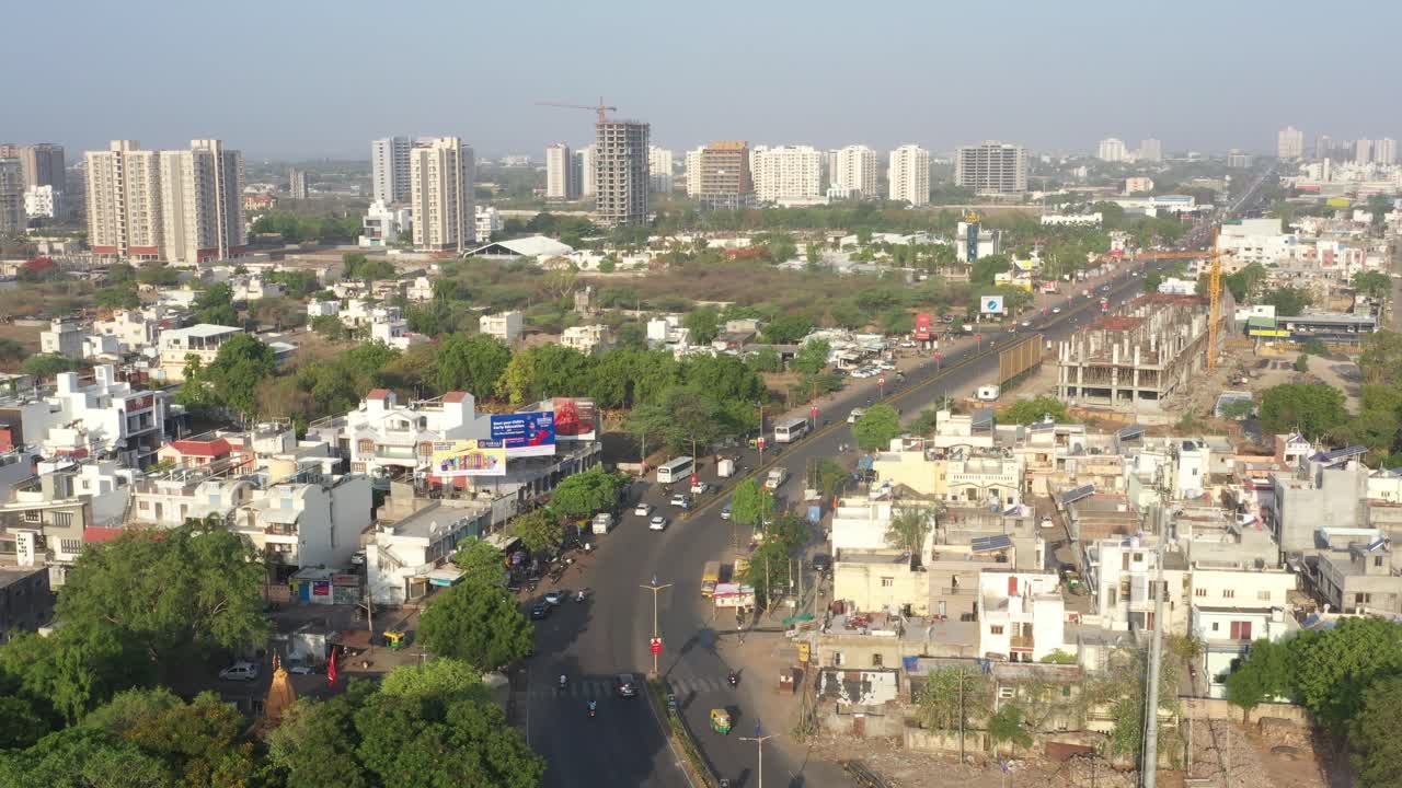 Aerial View of a Bustling Indian City with Roads, Buildings, and Construction