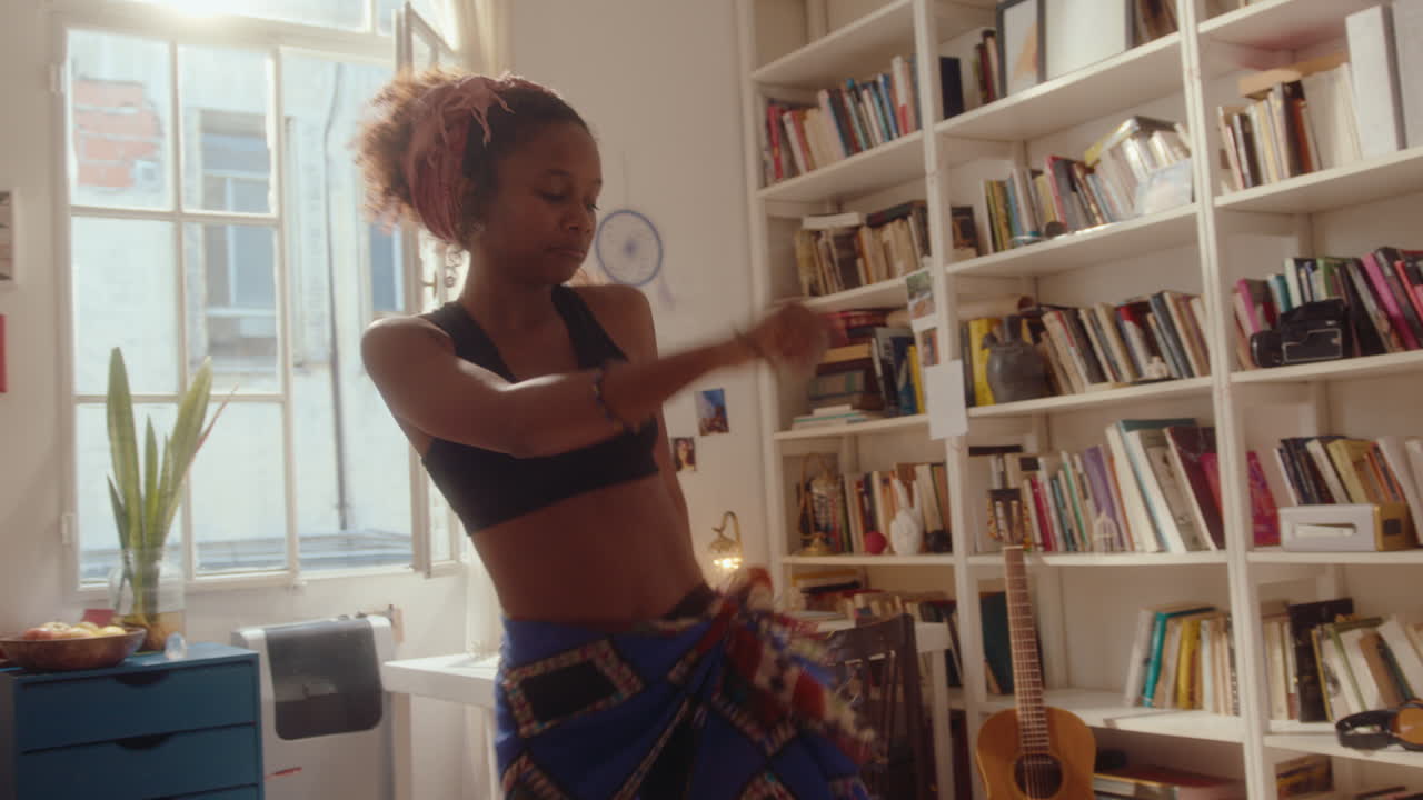Vibey Black Girl Dancing in Room on Sunny Day