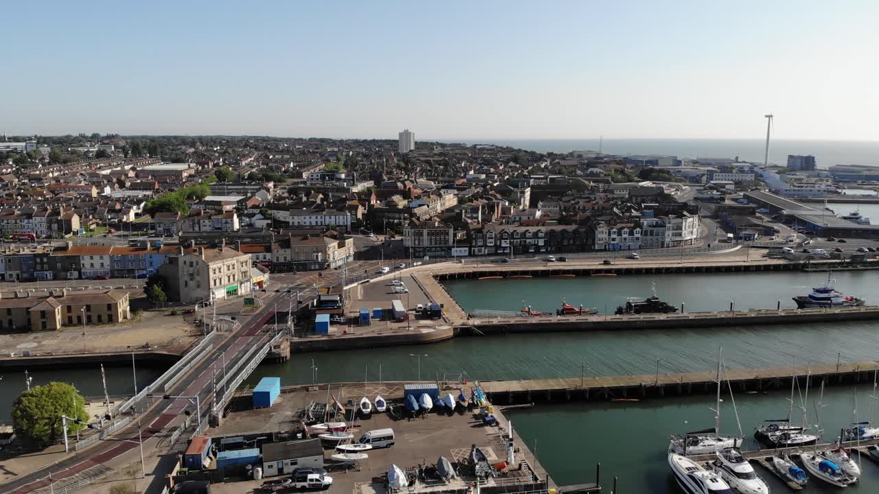 Low flying drone shot showing Lowestoft Marina and the town of Lowestoft in Suffolk, UK. 21.06.25