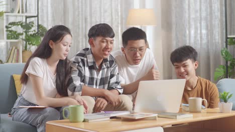 asian teen group studying online at home. having video conference on laptop, smiling, waving hands