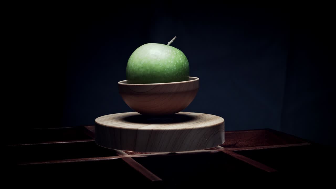 plataforma de levitación abstracta de 4k con manzana en fondo negro