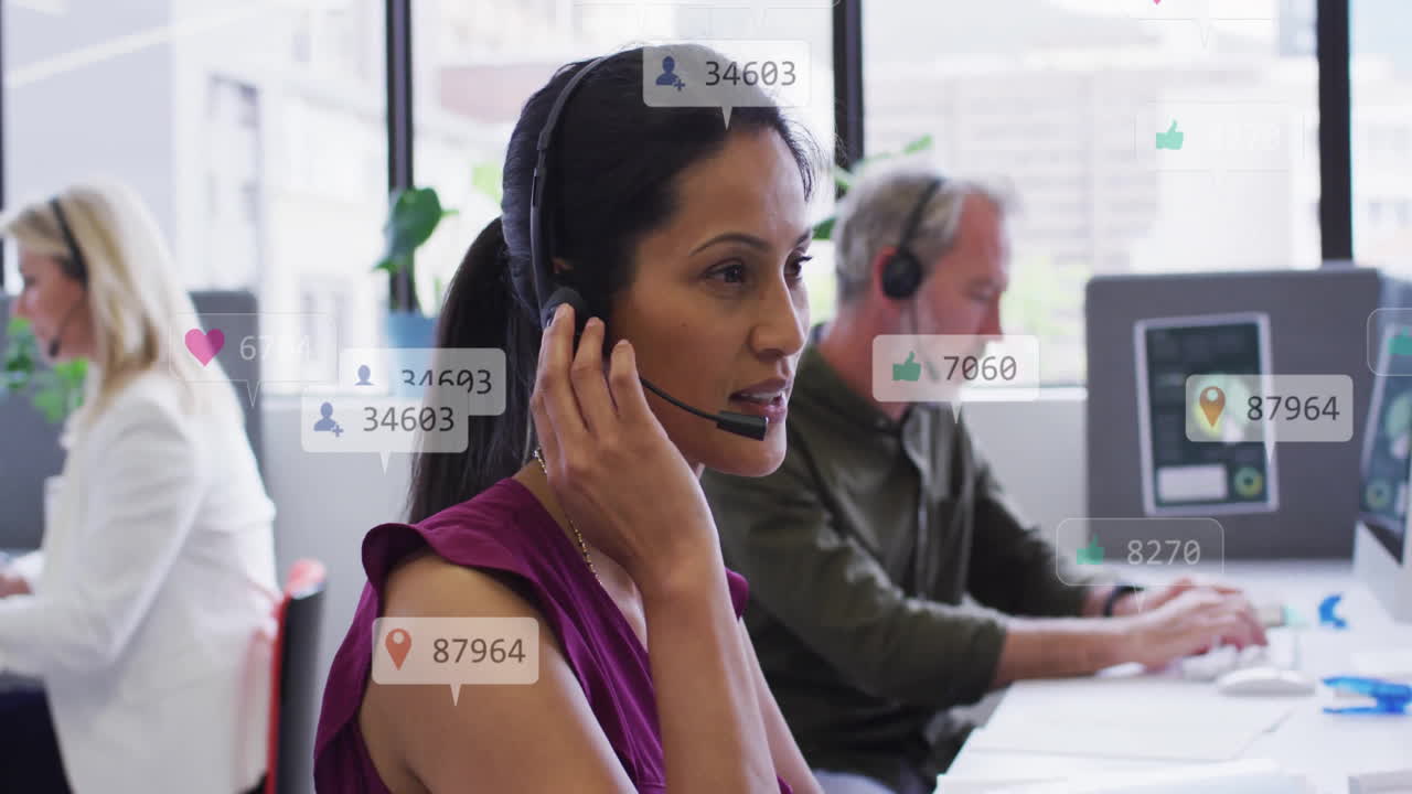 Animation of data processing over diverse business people using phone headsets in office