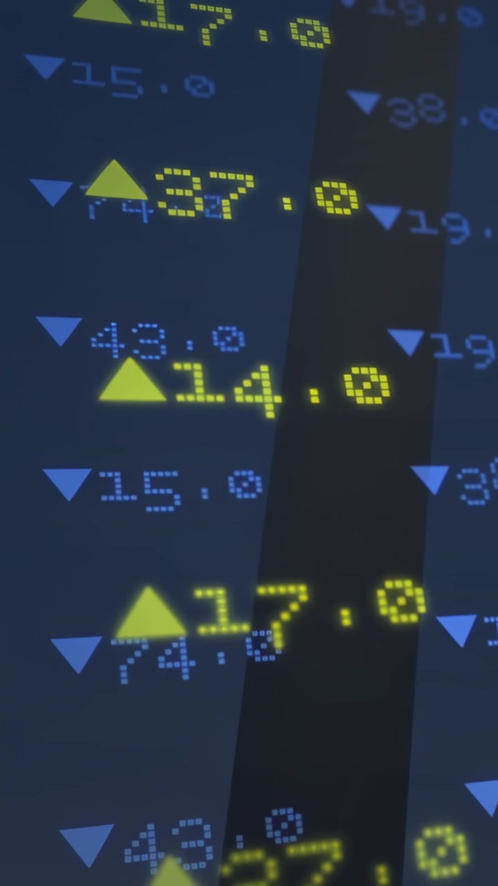 Vertical video: Turbine tower still while HUD looping and pulsing yellow blue data for energy