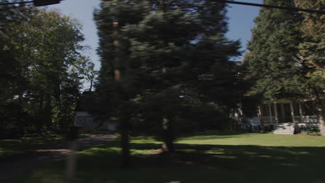 side window view of a typical american neighborhood