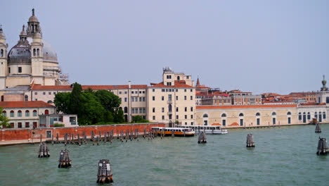 historical landmarks along giudecca canal in venice, northern italy. pov