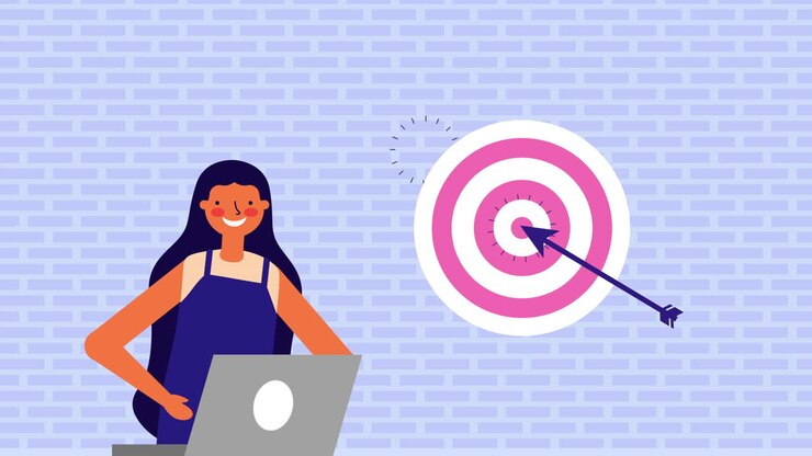 young woman with laptop and target