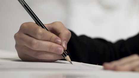 women sketching a drawing of a design studio