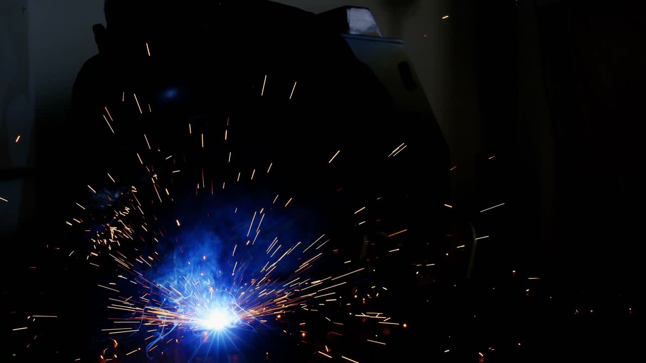 Welder welding a metal