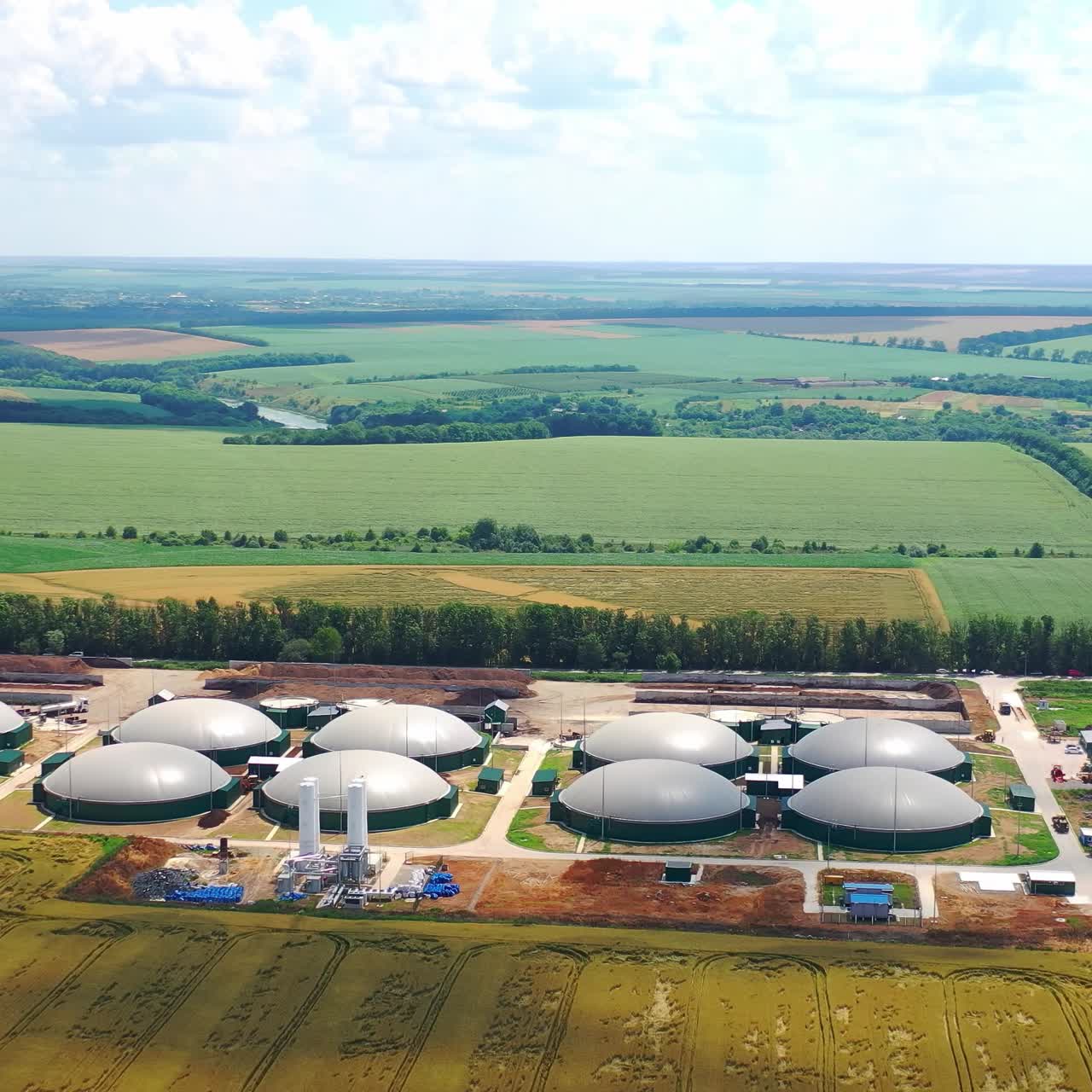 Biogas plant green energy. Biogas power plants from above with storage tanks