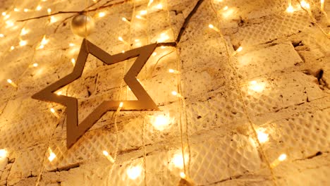 christmas garland with golden lights, close-up. christmas lights. bokeh