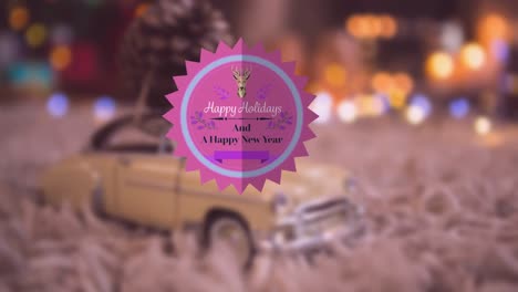 Animación-De-Felices-Fiestas-Y-Un-Texto-De-Feliz-Año-Nuevo-En-Círculo-Sobre-Un-Juguete-De-Coche-Contra-El-Efecto-Bokeh