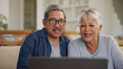 Senior,-couple-and-video-call-on-laptop-with-wave