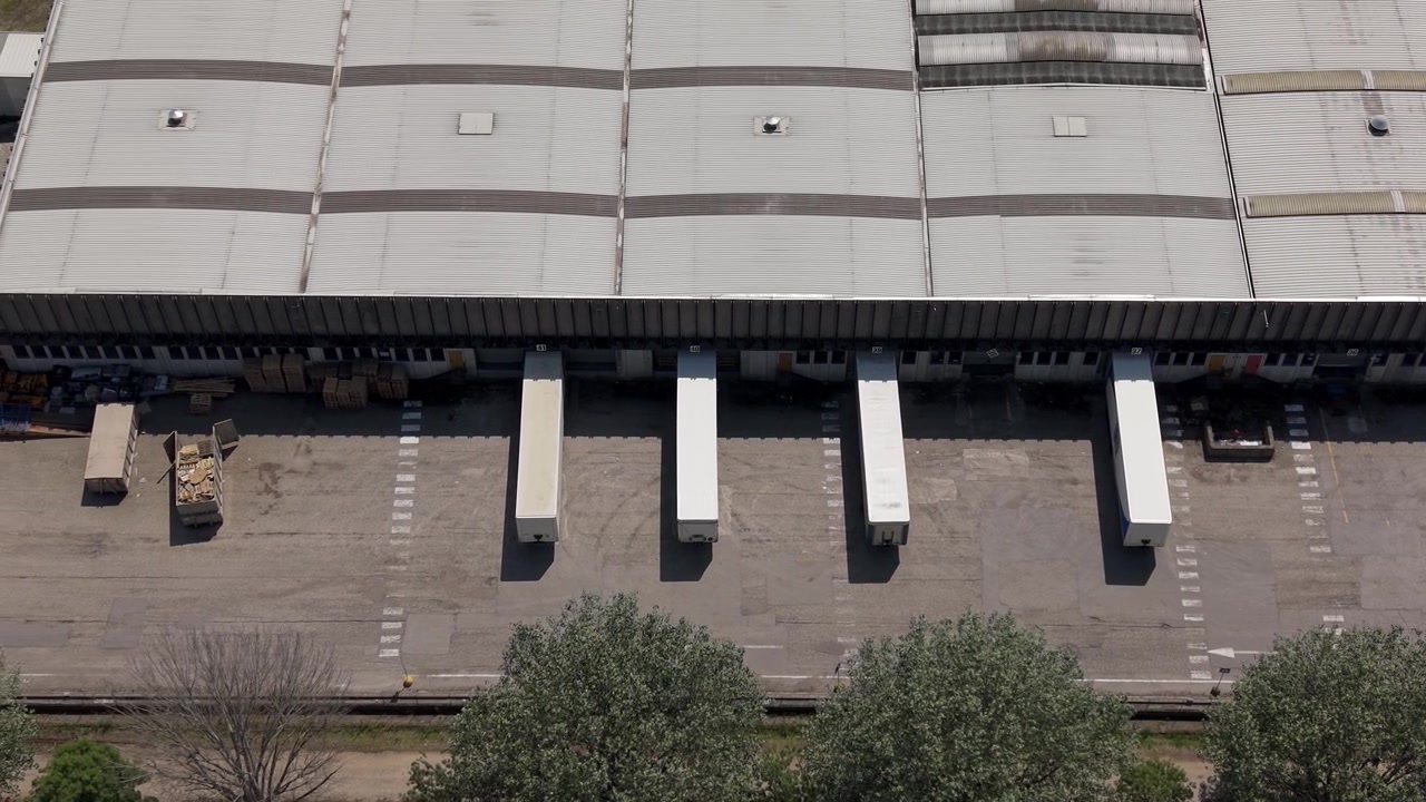 Commercial Beverage Manufacturing Site, Loading Dock Drone View Italy