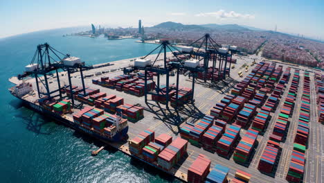 container ship at a port with cranes and cargo containers