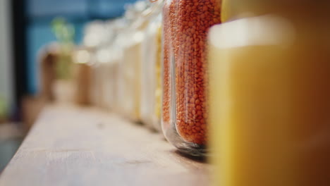 selective focus of pasta and cereals in glass jars