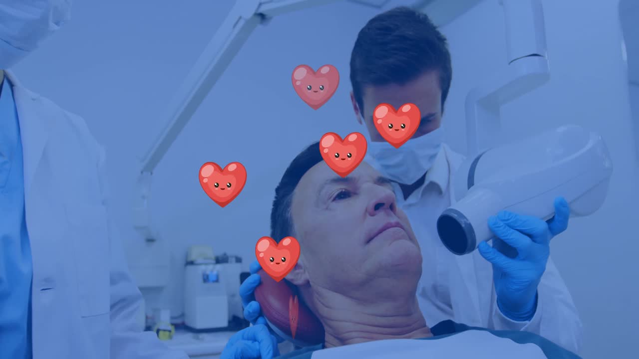 백인 남성 치과의사가 백인 남성을 치료하는 백인 남성 위에 심장 아이콘의 애니메이션