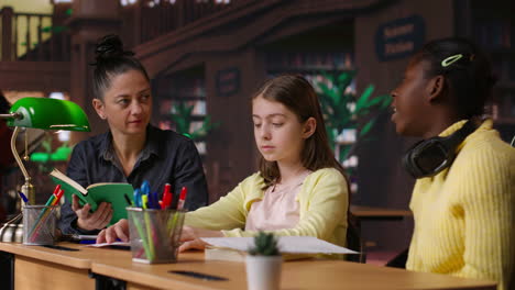 teacher and students in a classroom setting