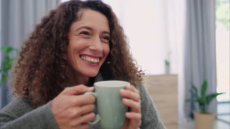 relax, smile and woman drinking coffee on a sofa