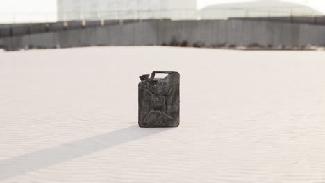 old rusted fuel can on the beach