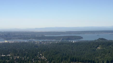 Lions-Gate-Bridge-And-Stanley-Park-On-Burrard-Inlet-Viewed-From-Grouse-Mountain-Gondola-In-Vancouver,-Canada