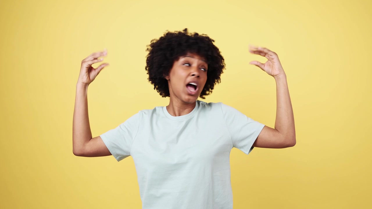 African American Woman Expressing Different Sizes with Hand Gestures