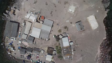 aerial cenital shot of a small remote island of fishermen, coyote island, sea of cortez