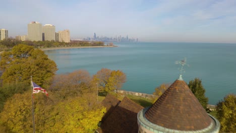 promontory point revealed by drone flying backward in fall