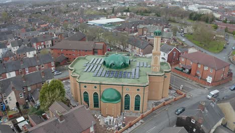 Aerial-view-of-Gilani-Noor-Mosque-in-Longton,-Stoke-on-Trent,-Staffordshire,-the-new-Mosque-being-built-for-the-growing-muslim-community-to-worship-and-congregate