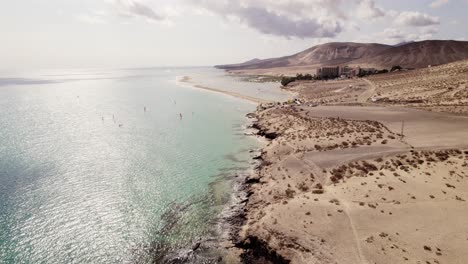 stunning aerial drone shot of sunny playa de sotavento de jandía, fuerteventura, beach, spain