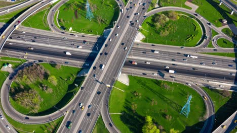 timelapse aerial view of a freeway intersection traffic trails in moscow.