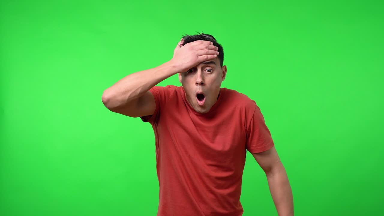 Desperate man because he realizes that he has forgotten to do something important.