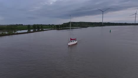 sailing boat in barendrecht, netherlands - aerial drone shot