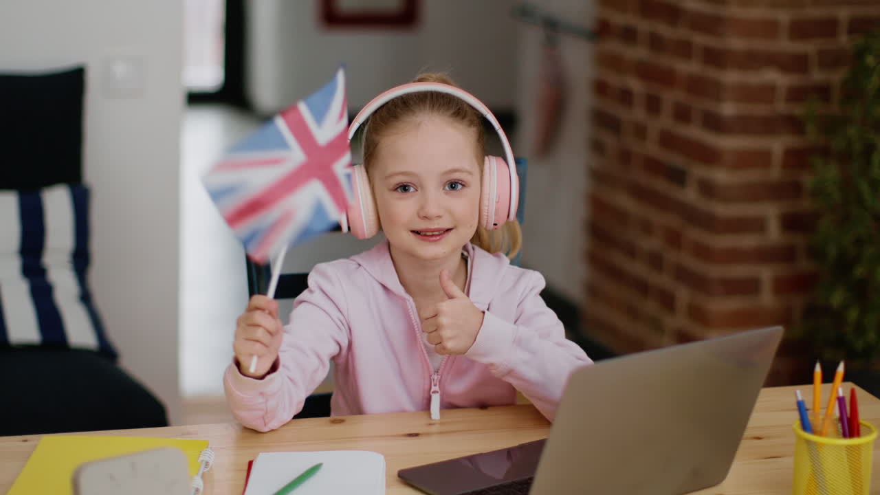 Girl learning online with UK flag
