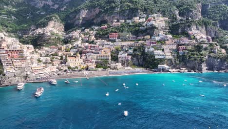 amalfi coast at positano in salerno italy. coastal city. waterfront landscape. amalfi coast at positano in salerno italy. beach scenery. medieval buildings. amalfi coast skyline
