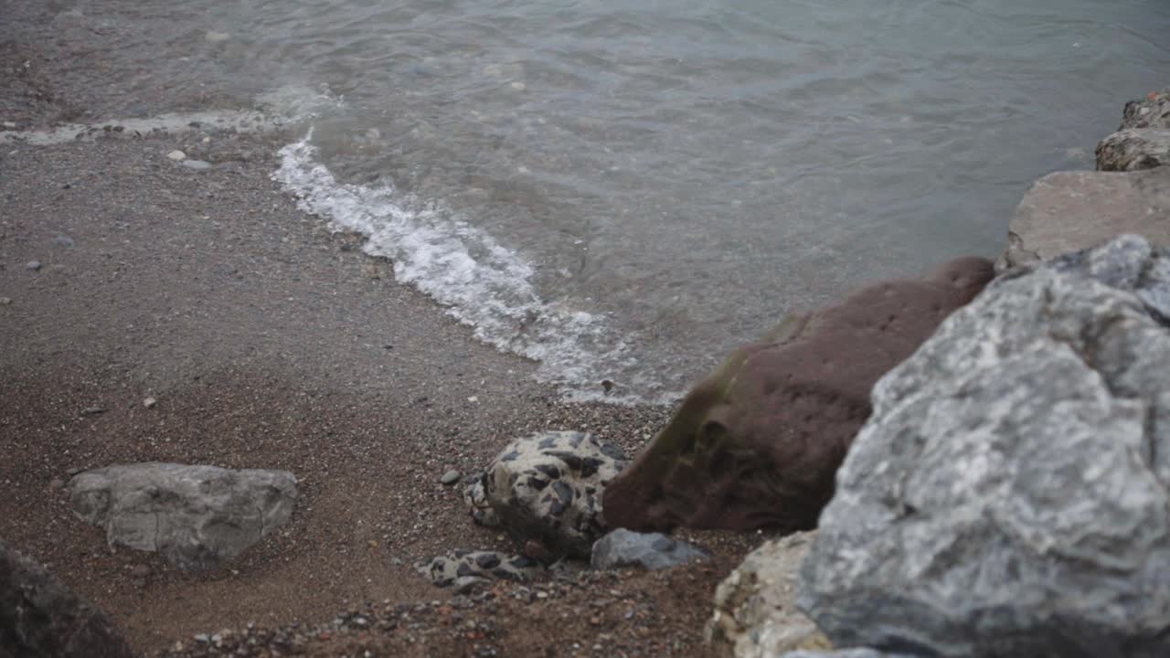 Sea Waves Splashing On The Rocky Beach In Canada - Close Up Shot