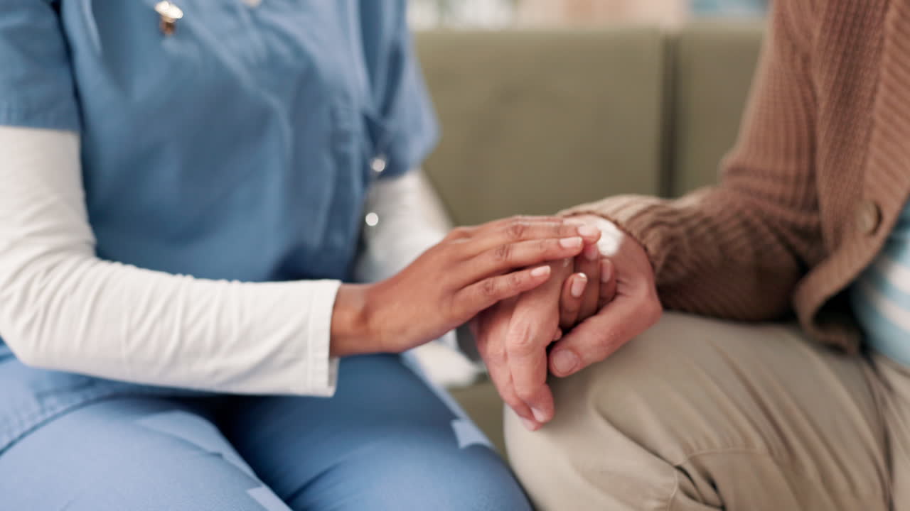 Caregiver providing support and comfort to a senior patient