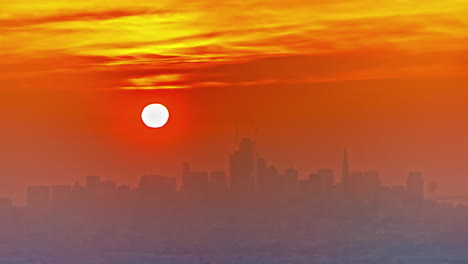 a beautiful timelapse of sun with buildings in the background