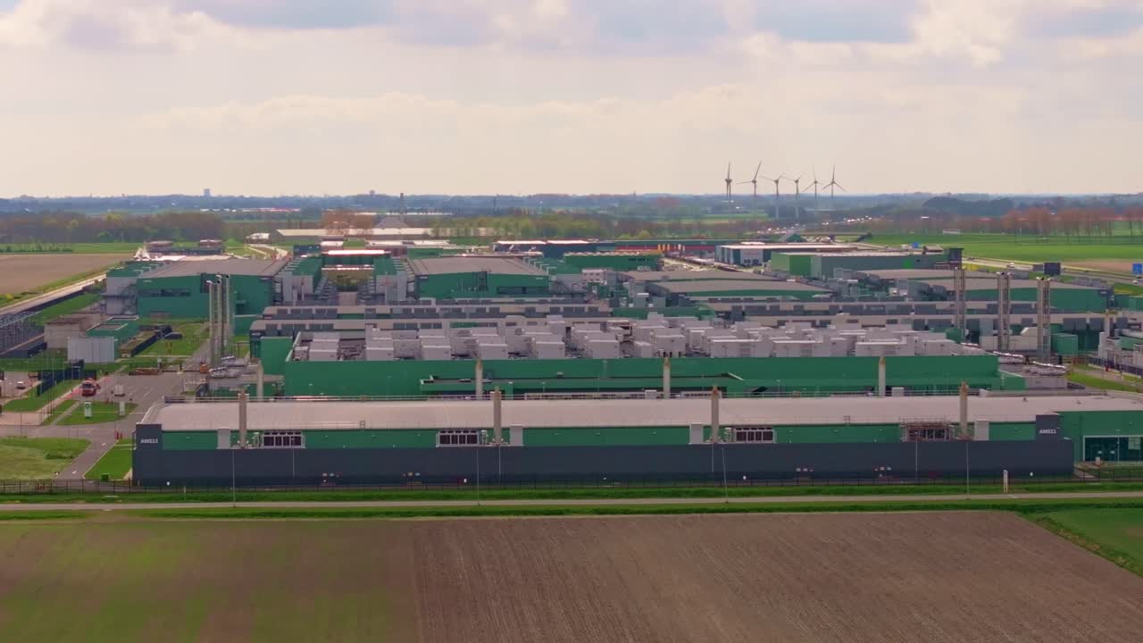 Modern data complex shown in sharp architectural close-up. Aerial drone video