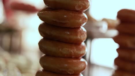 krispy kreme glazed donuts stacked for dessert at wedding reception