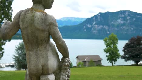 naked statue in meggen, switzerland