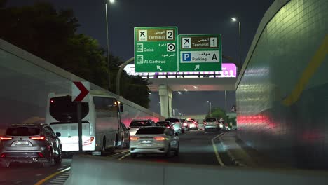 evening rush hour brings slow-moving traffic to the streets of dubai, uae