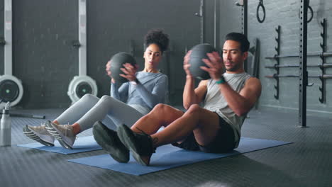 Fitness,-medicine-ball-and-friends-on-gym-floor