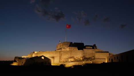 the castle of kars at twilight in eastern turkey.
