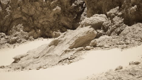 a large rock in a desert canyon