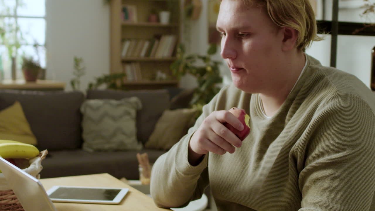 Teenager using laptop on the table