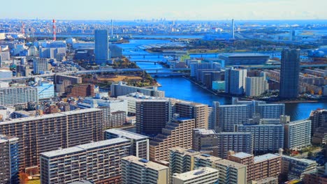 asia business concept for real estate and corporate construction, modern city skyline aerial view of tokyo under blue sky in japan