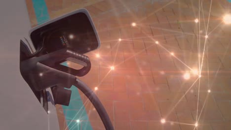 carga de automóviles a través de conectores de luz roja de fondo