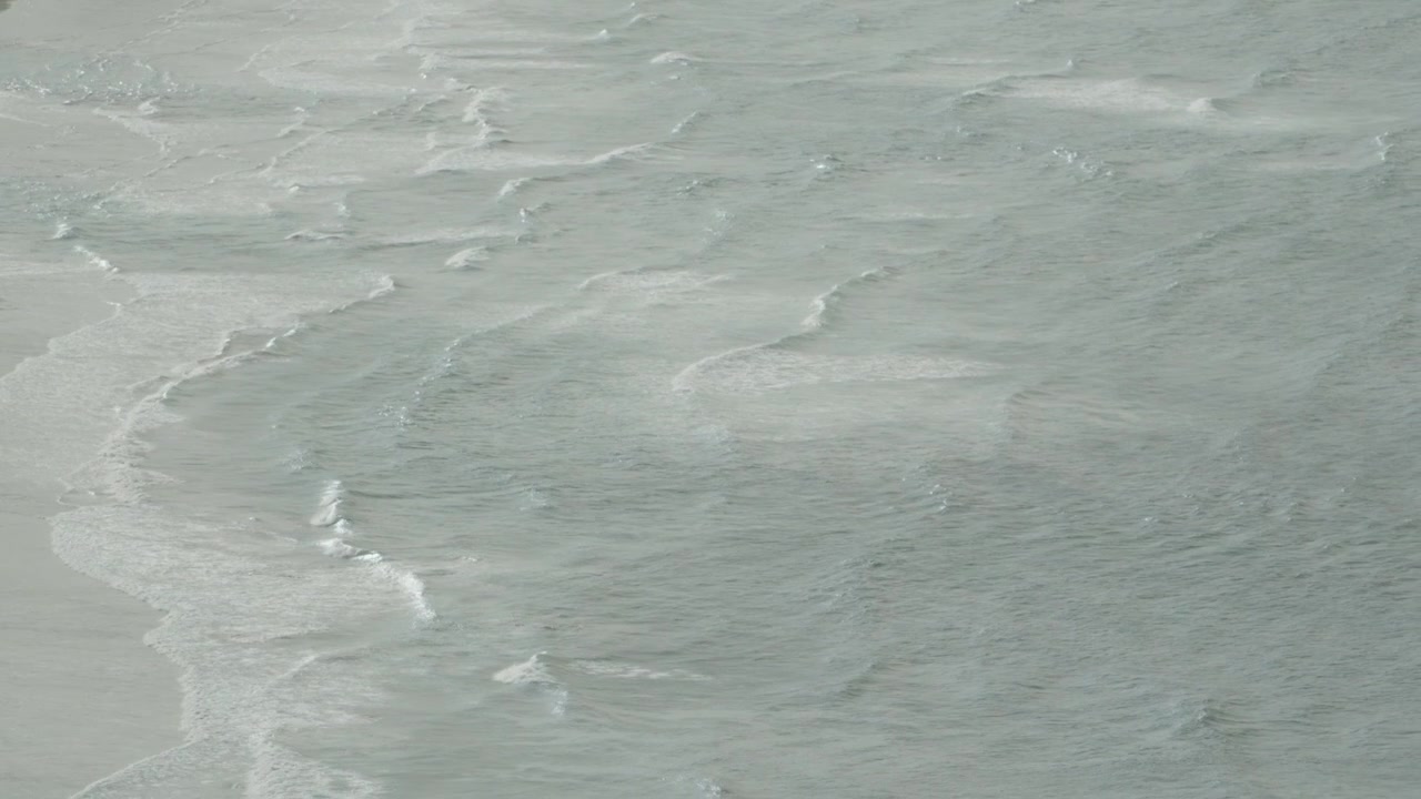 View of sea waves and ocean water surface seen from Campa Torres in Gijon Spain