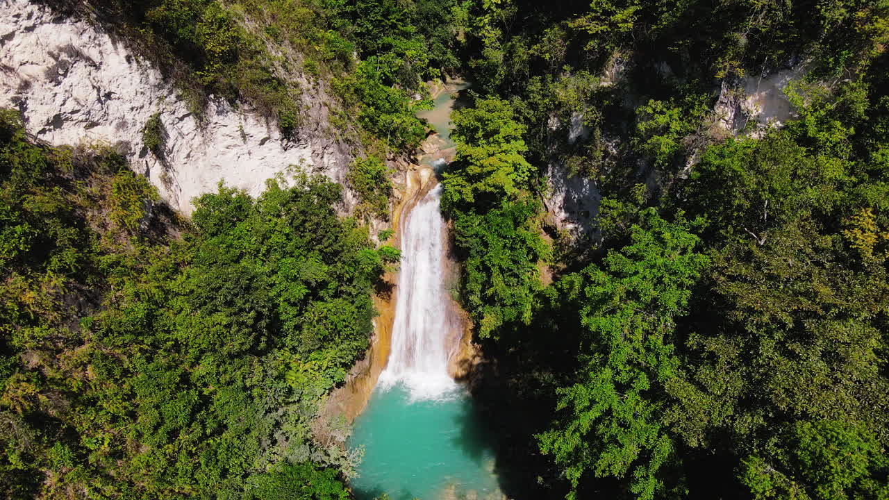 Aerial View Of Waterfall In The Midst Of Wilderness In Summer